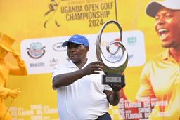 Steven-Katwiremu-hoists-the-trophy